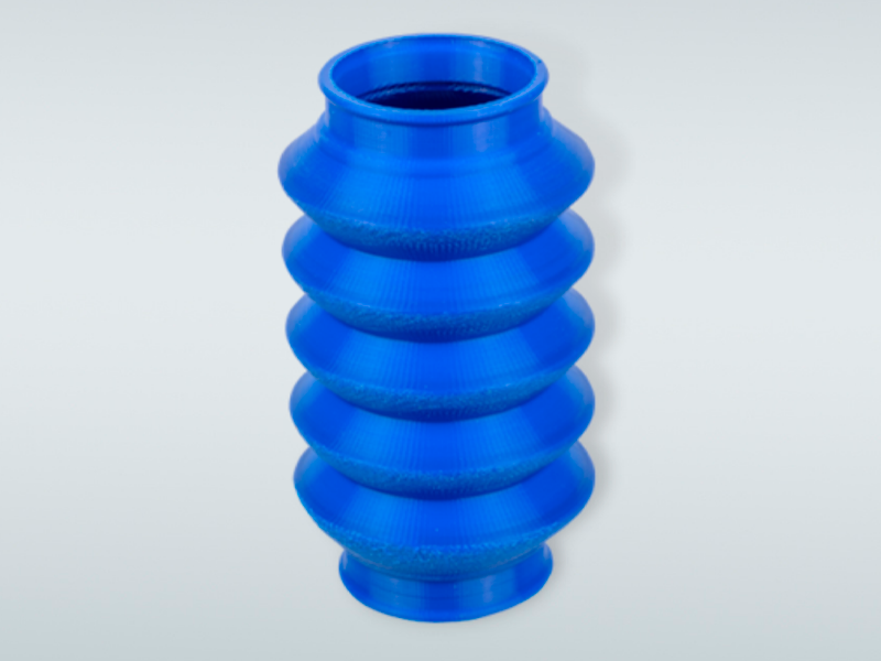 A flextube 3D printed with the blue Ultrafuse TPC 45D filament